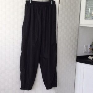 Mens Speedo Pants size XL  color black sippers on bottom of legs   #449